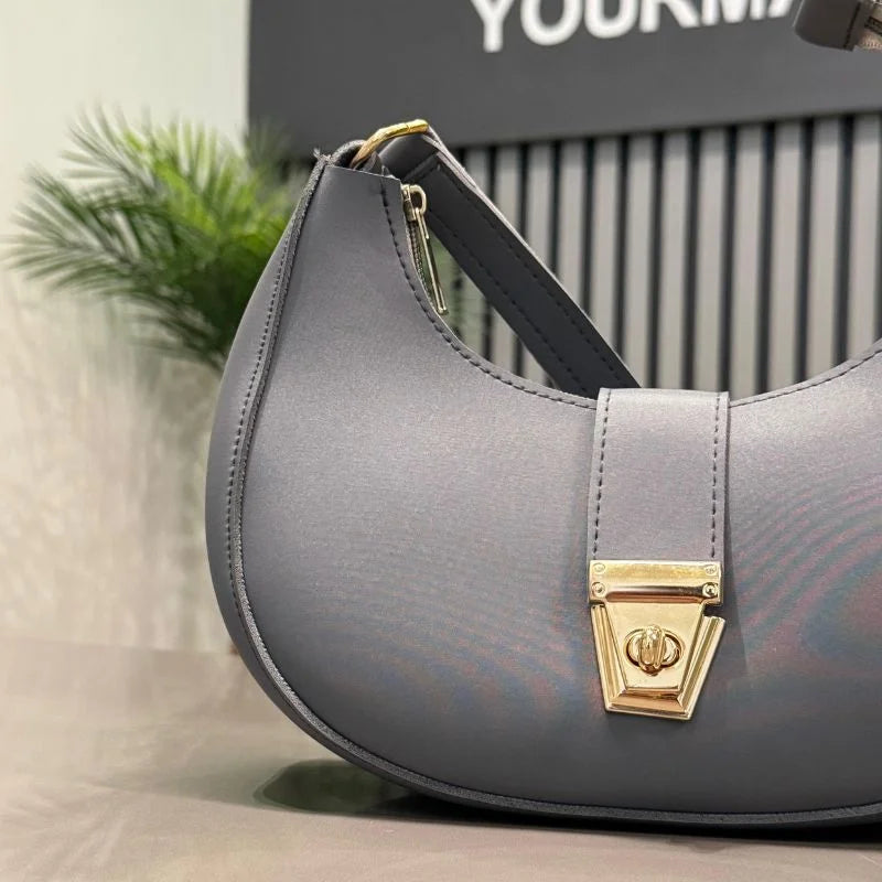 Dark gray crescent shoulder bag detail view