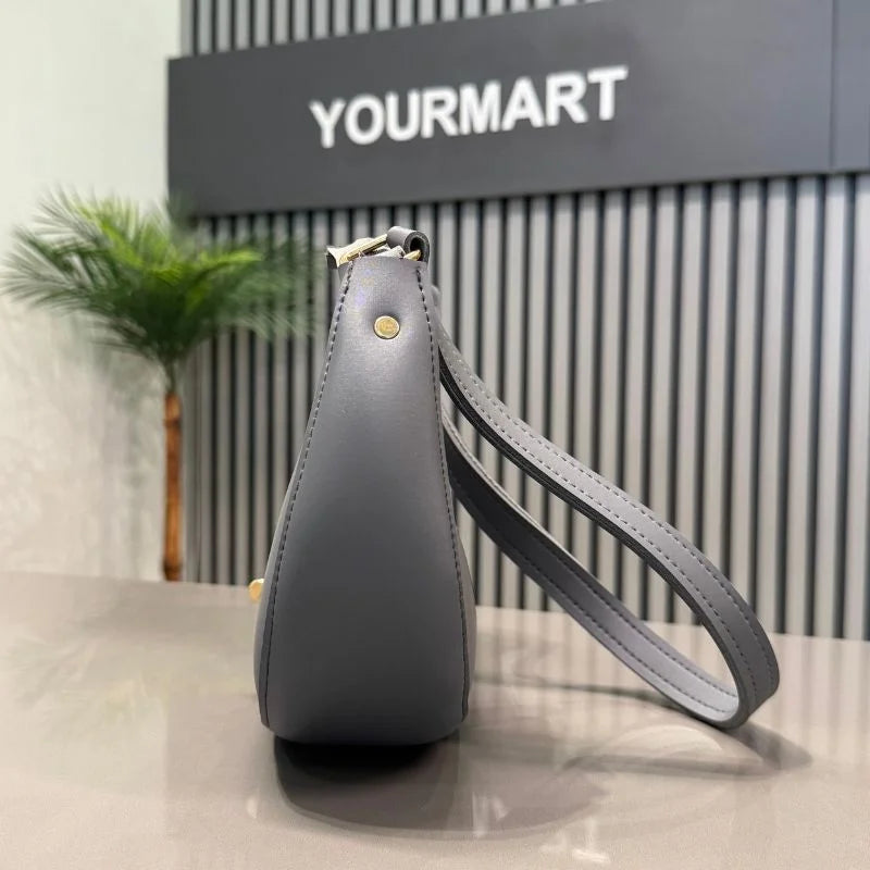 Dark gray crescent shoulder bag lifestyle view